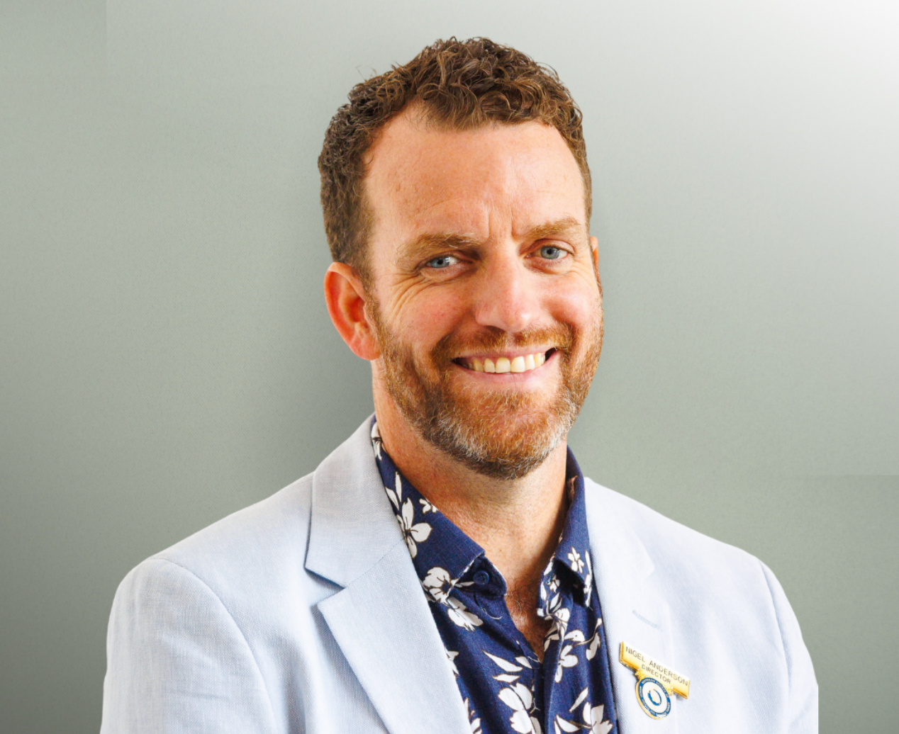 A smiling headshot of Nigel Anderson