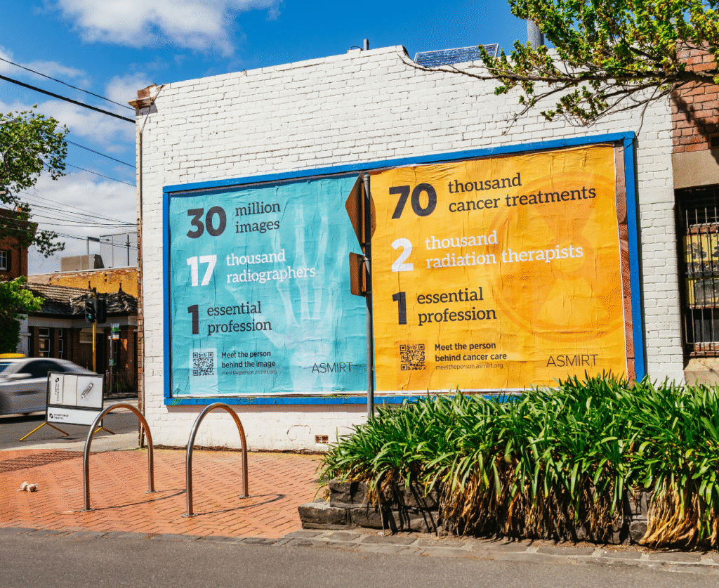 Huge radiography and radiation therapy posters on display on a main road.